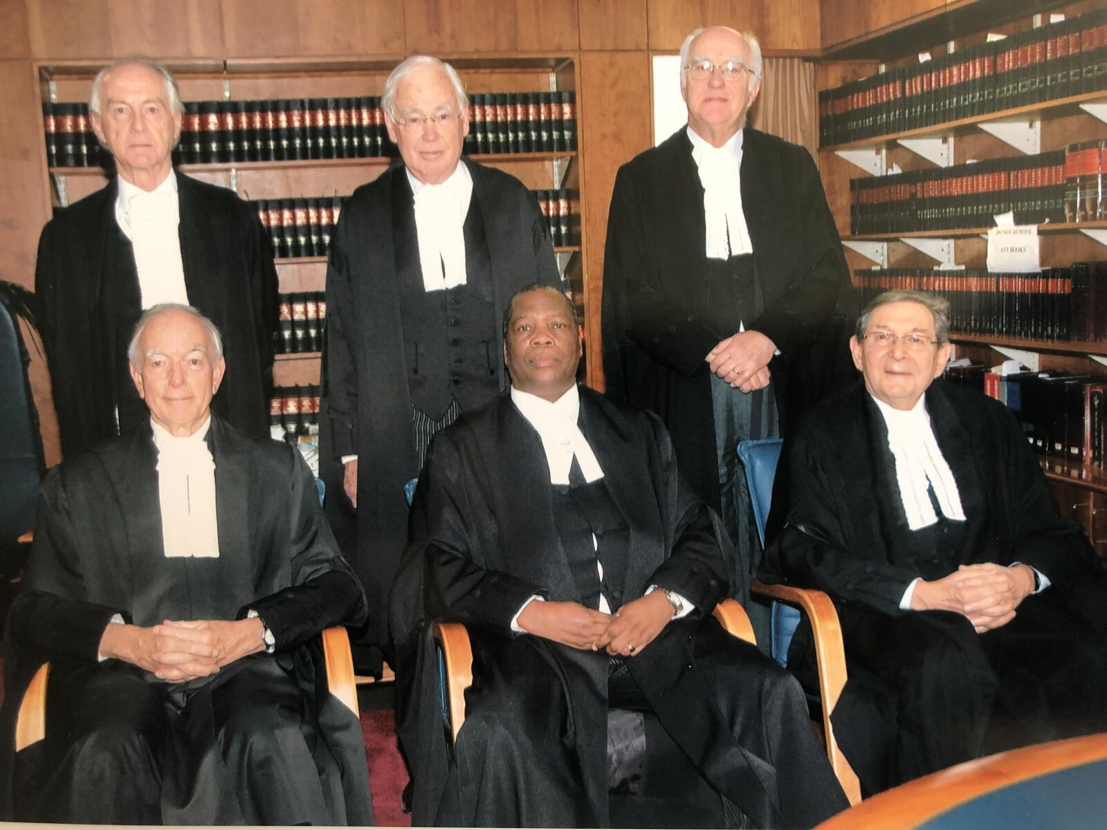 Seated with fellow members of the appellate bench in the court library — photograph supplied by the family
